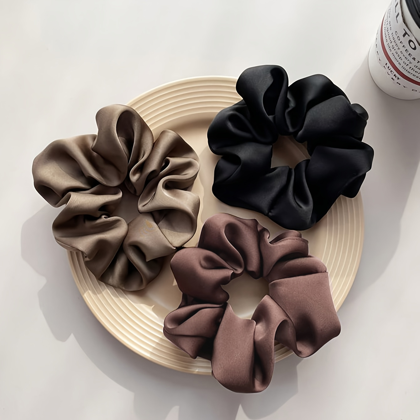 A set of three monochrome sati - Hair Care Gift Set review and price